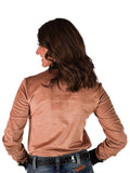 Woman wearing a tan mid-weight stretch suede button up with black trim and western swirl embroidery