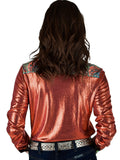 Woman wearing a rust metallic long sleeve button up shirt with colorful paisley trim