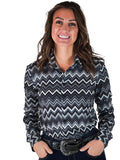 Woman wearing a grayscale chevron print button up shirt.