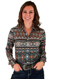 Woman wearing a colorful geometric print long sleeve button up shirt.
