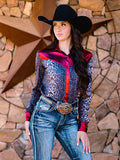 Woman wearing a gray leopard print long sleeve button up shirt with red satin accents