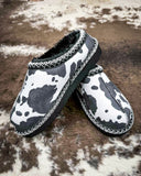 Very G black and white cow print slippers with faux fur lining and durable non-slip sole, cozy western women’s indoor outdoor shoes