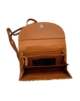 A tan leather crossbody bag shown open, displaying its interior compartments including card slots, a zippered pocket, and a coin purse, set against a plain white background.