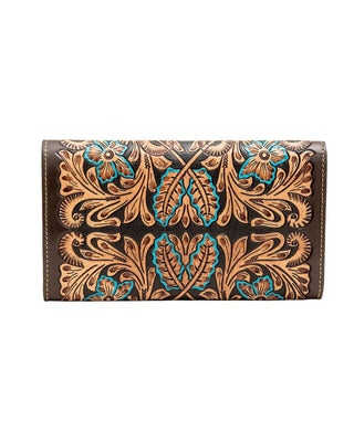A brown leather wallet with intricate hand-tooled floral and scroll patterns in warm tan and turquoise blue, shown against a plain white background.