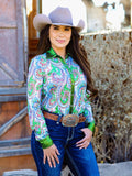 Model wearing Paisley Penelope Pullover Button-Up paired with denim jeans in a Western setting.