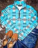 The Laramie Kreek Fitted Pullover displayed on cowhide along with shoes and jeans.