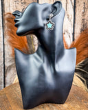 earring on  mannequin 