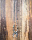 Necklace on ruler.