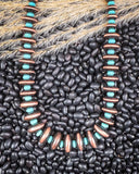 necklace on beans and wheat