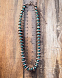 necklace on ruler