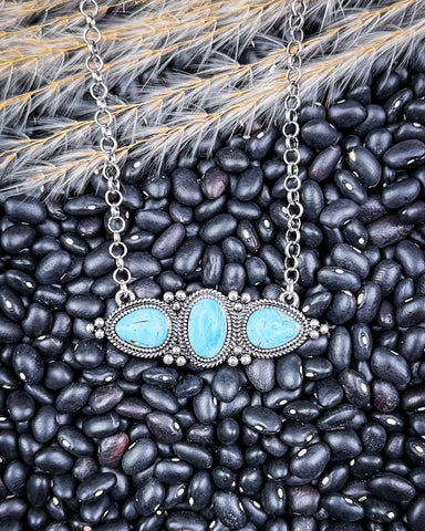 necklace on beans and wheat 