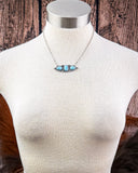necklace on mannequin 