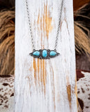 necklace on wood