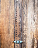 necklace on ruler 