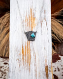 necklace on wood