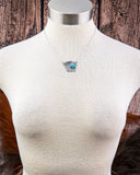 necklace on mannequin 