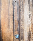 necklace on ruler