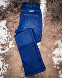 Denim Jeans on cowhide rug