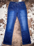 Denim Jeans on cowhide rug