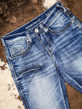 Zoom in of the Dare Me Trouser Jeans to show the pockets and zipper. It is displayed on cowhide.