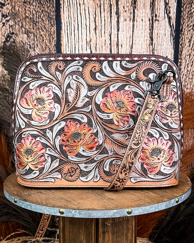 Crossbody Purse displayed on wooden table.