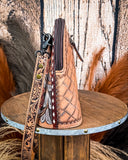 Crossbody Purse displayed on wooden table.