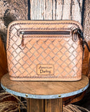 Crossbody Purse displayed on wooden table.