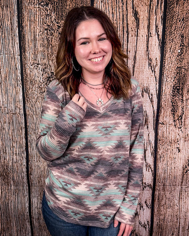 Burned Out Long Sleeve Aztec Top modeled on person.