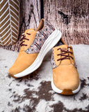 Twisted X Feather X sneaker on a rustic background