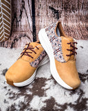 Twisted X Feather X sneaker on a rustic background
