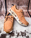 Twisted X Feather X Slip-On Shoe on a textured surface