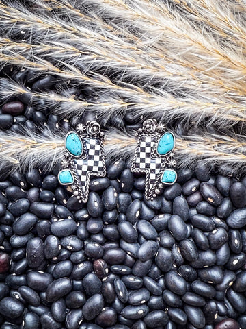Earrings styled on beans and wheat.

