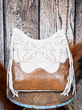 Rustic western handbag with floral tooled leather, ivory suede, and fringe detailing