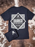 Back of Havasu Tee featuring large Bronco Western Supply Co. graphic with western print border.