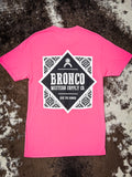 Flat lay of full back view of neon pink Bronco tee with bold monochrome logo design