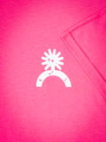 Close-up of Bronco white sun and horseshoe logo on neon pink t-shirt fabric