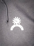Close-up of white spur logo on chest of black Bronco hoodie.