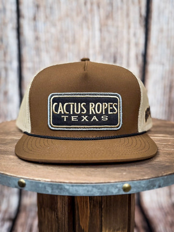Front view of Cactus Ropes hat on a wood background