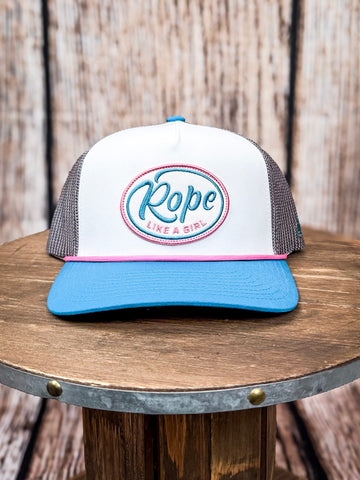 Front view of Rope Like a Girl Hooey hat on a wood background