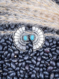 Earrings shown on beans and wheat