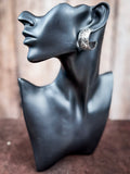 Mannequin wearing a hoop to show the size