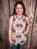 Model wearing tank top standing in front of a wood background.
