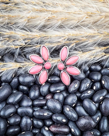 stud earrings on beans and wheat