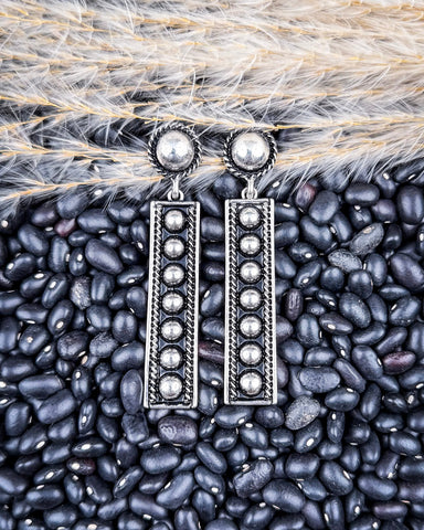 earrings on beans and wheat