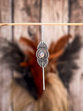 ear pin on wood