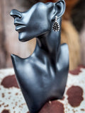 stud earring on mannequin