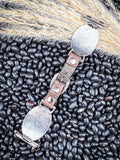 back of watch band, on beans and wheat