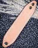 back of bracelet on beans and wheat