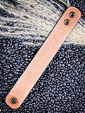 back of bracelet on beans and wheat
