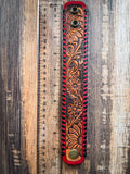 bracelet on wood with ruler